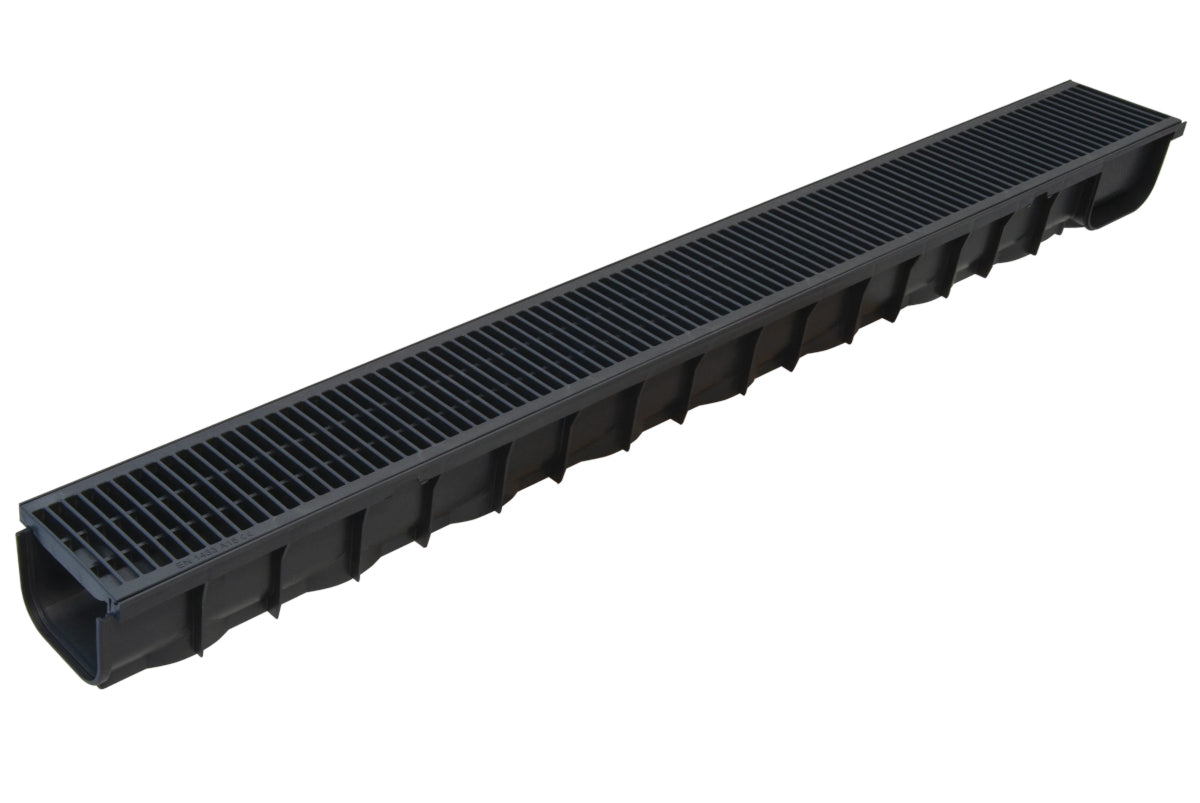 Black channel drainage with plastic grate on a white background
