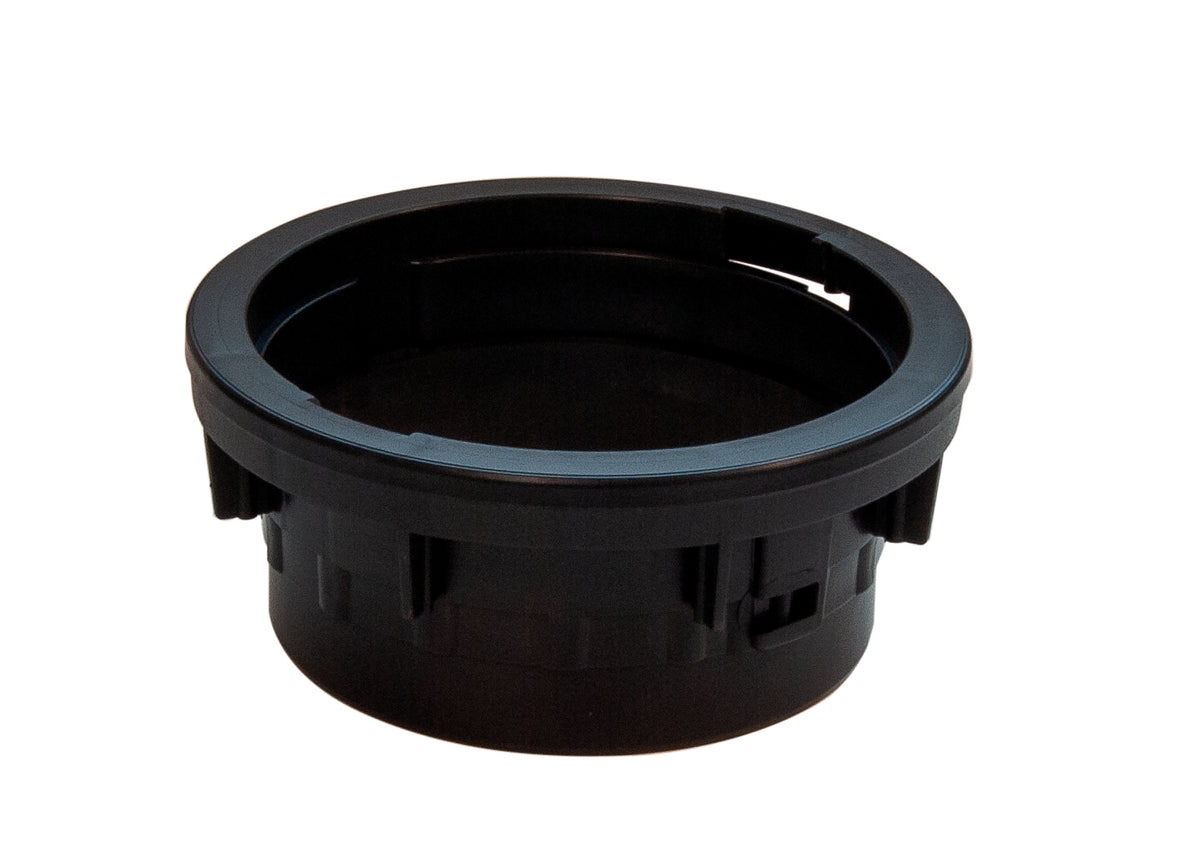 Black plastic component on a white background