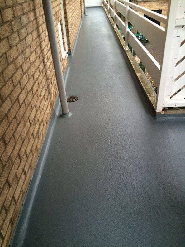 RapidRoof Waterproofing Kit installed on a balcony area with clean seamless coating.
