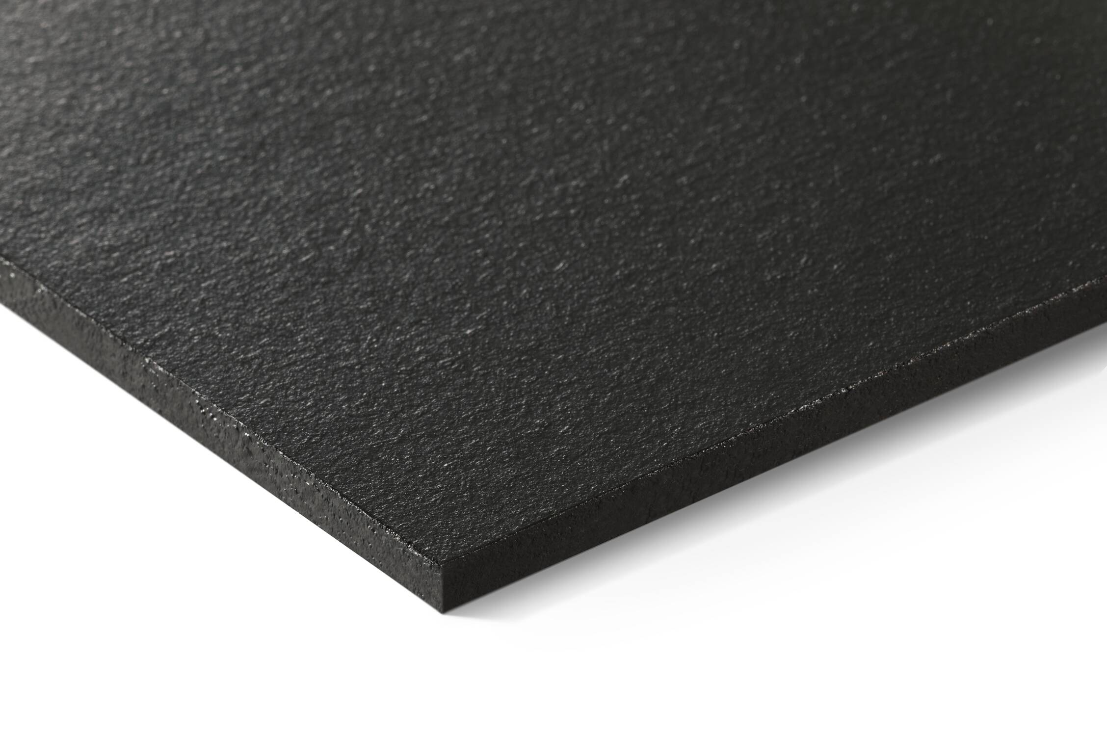 Graphite coloured fibre cement roof slate on white back