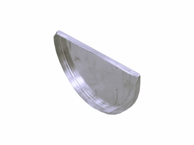 Metal Gutta zinc half round gutter stop end for sealing the end of a zinc gutter run.