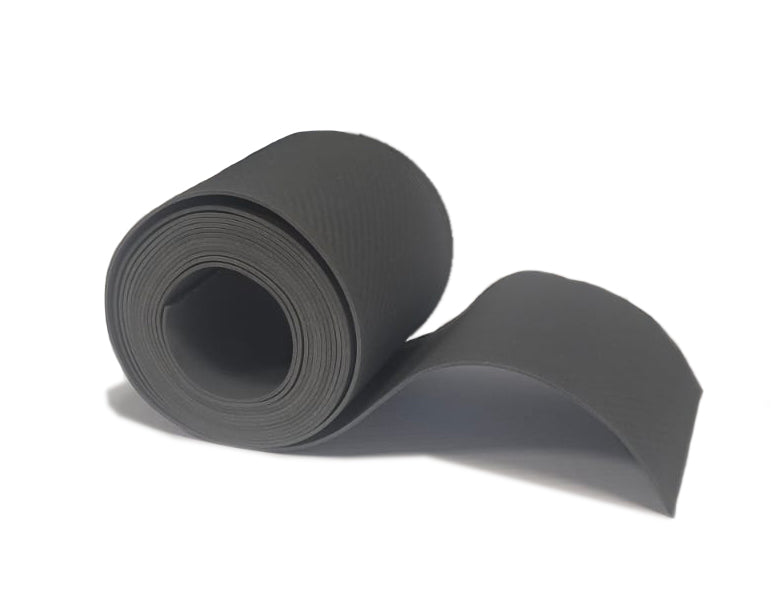 A close-up view of the dark grey roofroll Slate EPDM flashing unrolling to demonstrate material thickness.