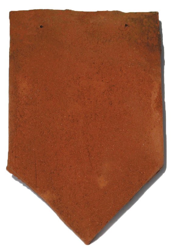 Arrowhead tile from Tudor Tiles with pointed base and handmade clay finish

