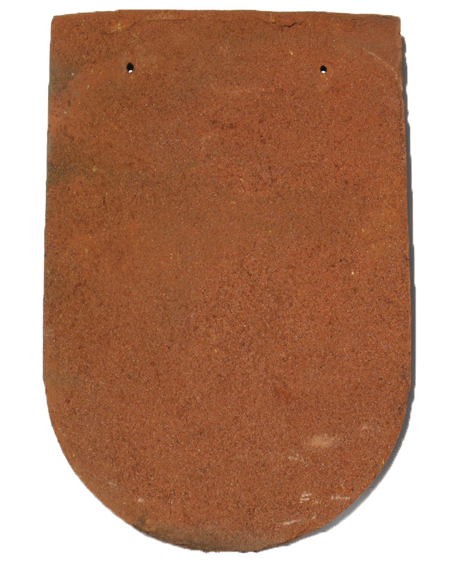 Bullnose roof tile with smooth curved edge in a traditional clay finish from Tudor's ornamental tile range.