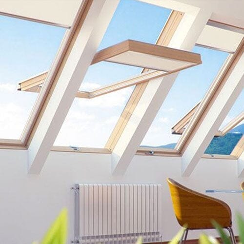 Fakro Wifi Electrically Operated Centre Pivot White Painted Pitched Roof Window