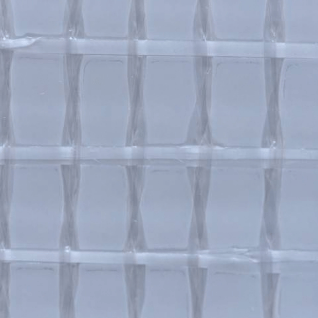 A close-up of a translucent square grid or lattice material with a frosted, icy appearance.