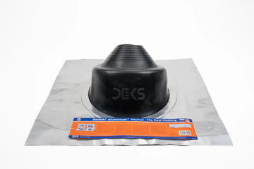 Black roof flashing piece on a metal sheet with 'DEKS' branding on a white background