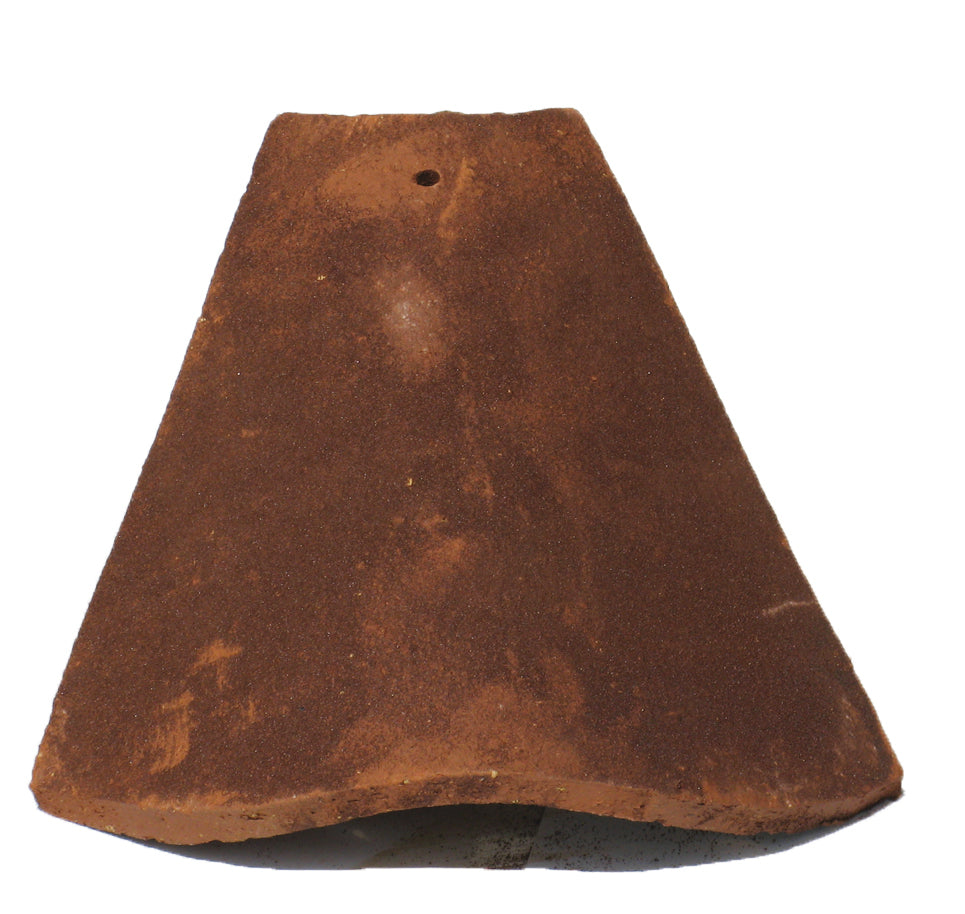 Top view of compact clay Kent roof hip tile with gently curved bonnet shape