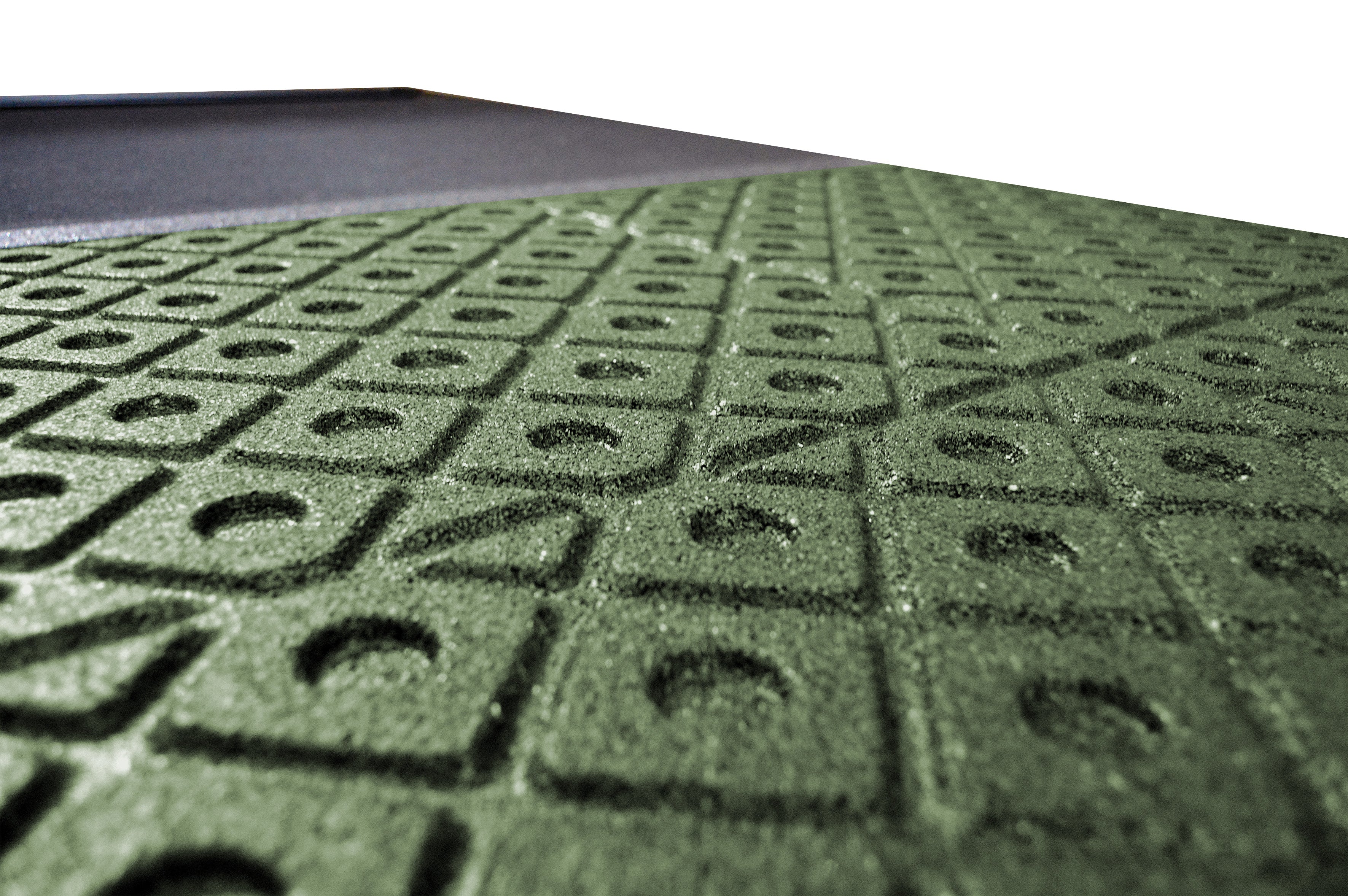 Close-up of green ecotred 500 tile underside drainage channels.