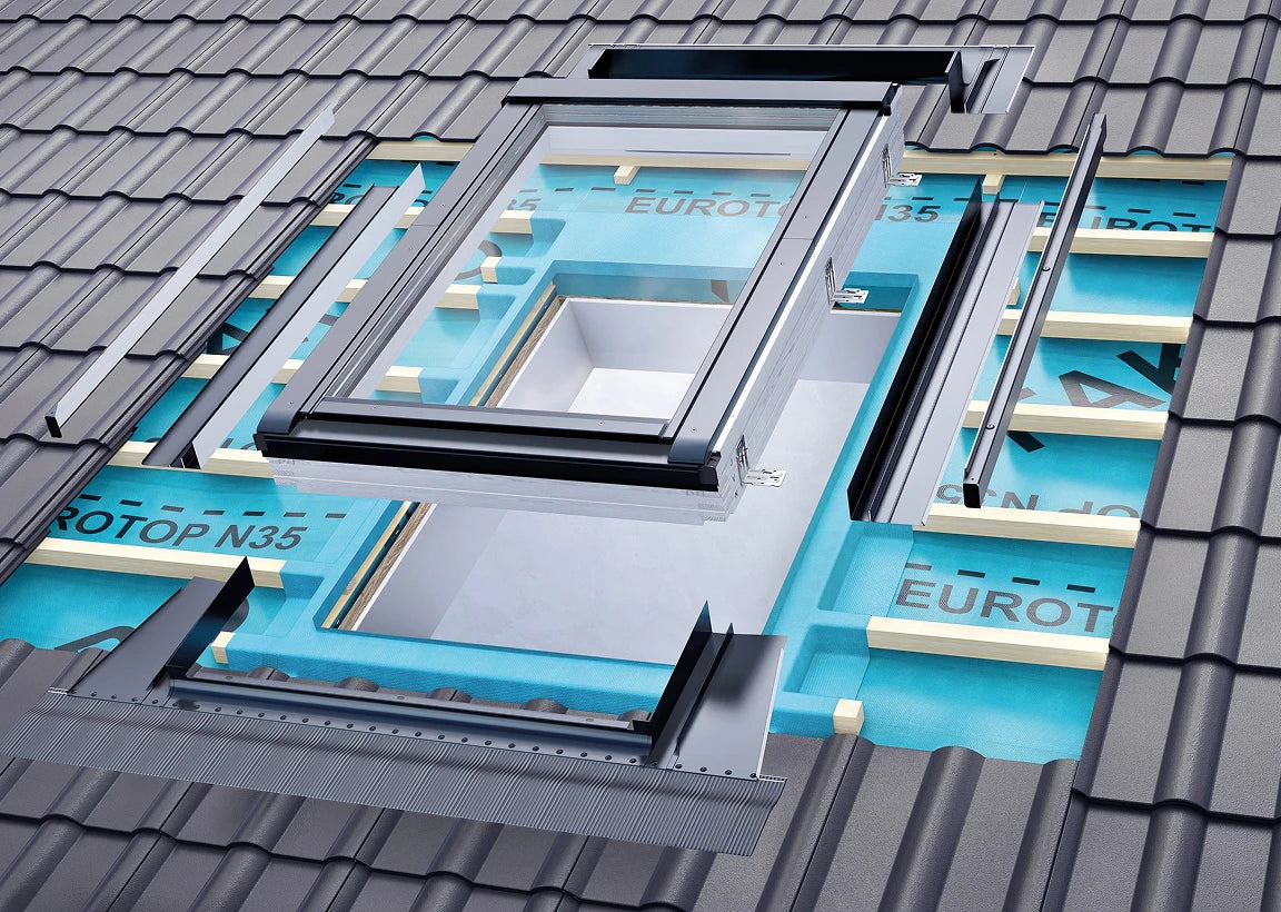 FAKRO flashing construction with insulation collar and drainage gutter